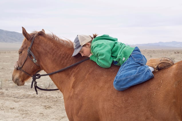 Kole and Bargain while walking the horses. Dixie Valley, Nevada 2015