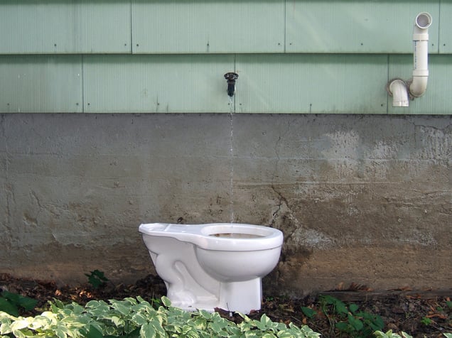 'Fountain, version 3.0.6,' toilet (found in nearby trash pile, and faucet with running water, in homage to Marcel Duchamp.