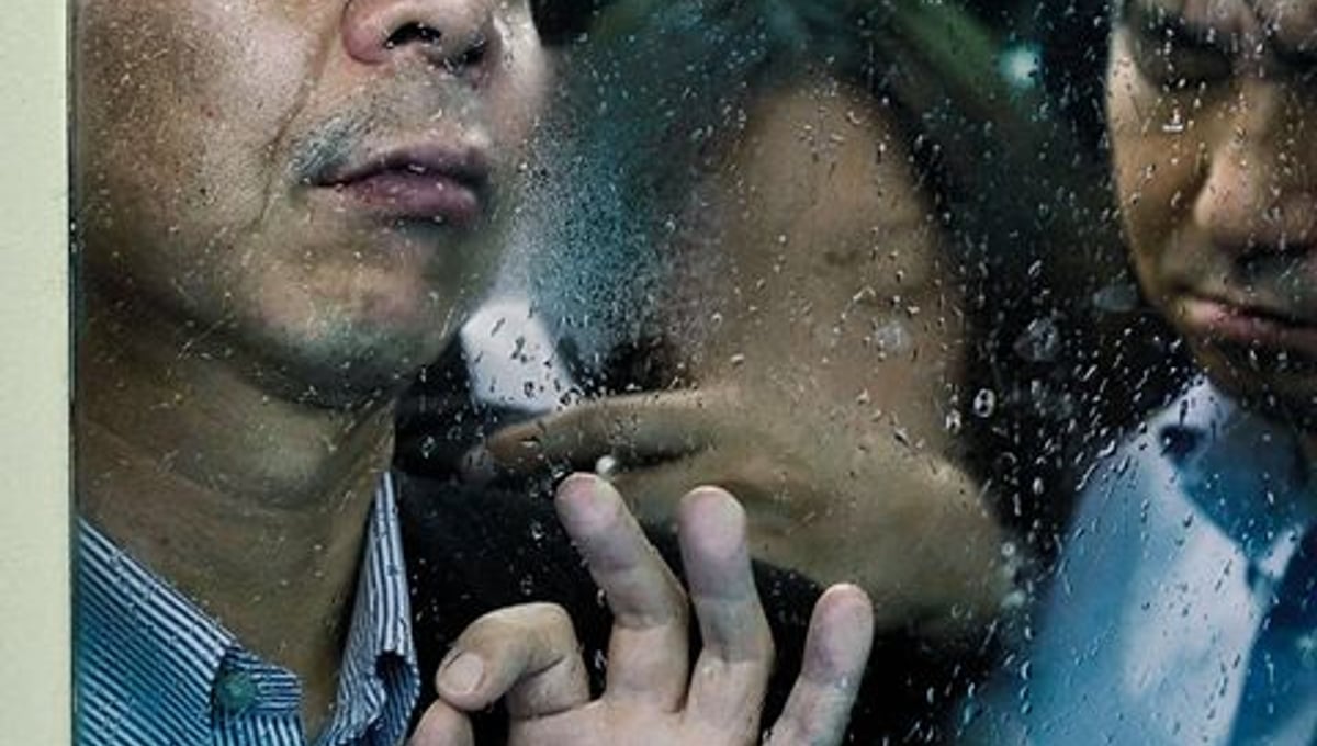 From the book and series, "Tokyo Compression" © Michael Wolf