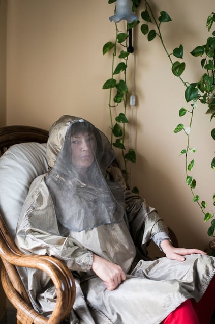 Erika, 53 years old, wearing her electromagnetic shielding clothes that she uses to go out.