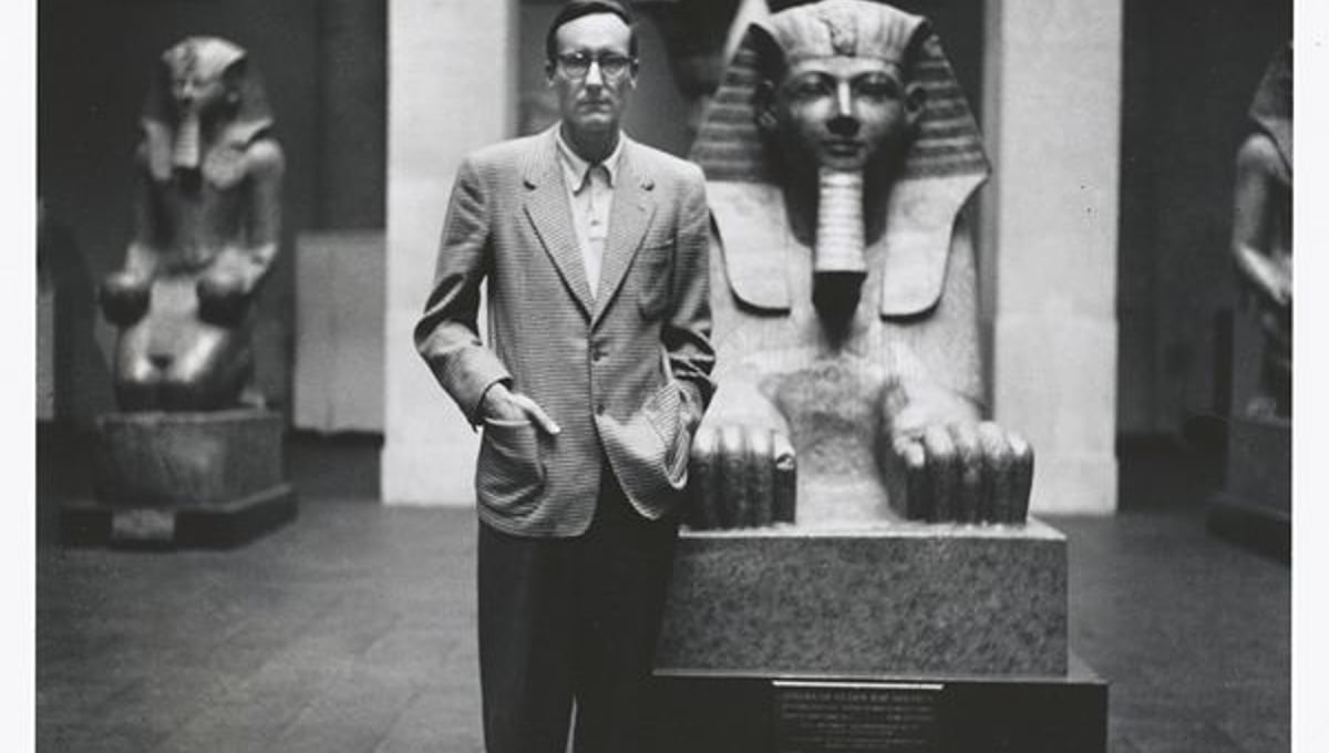 We went up to look at Mayan Codices at Museum of Natural History  Metropolitan Museum of Art to view Carlo Crivellis green-hued Christ-face with crown of thorns stuck symmetric in his skull - here Egyptian wing William Burroughs with a brother Sphinx, Fall 1953 Manhattan. © Allen Ginsberg