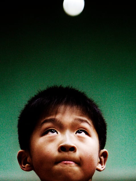 Talented table tennis player Cheng Haolun practicing at Beijing Shichahai Sports School, an elite school for young athletes. The school with its slogan “united, fighting, enterprising and diligence”, has bred World Champions.