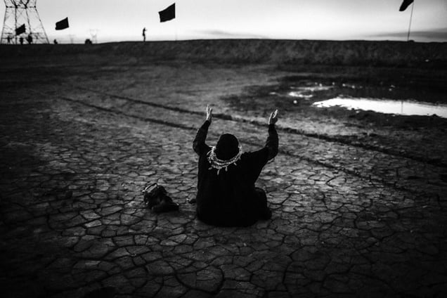 Zahra Banazadeh (68), the mother of 19-year-old Hamidreza Raee Banazadeh, has waited for him for around 27 years. Every new year, she—as with many Iranians—visits a former war zone, such as this one near Shalamcheh, one of the main sites of the Iraqi invasion. Such locations are seen as holy ground.