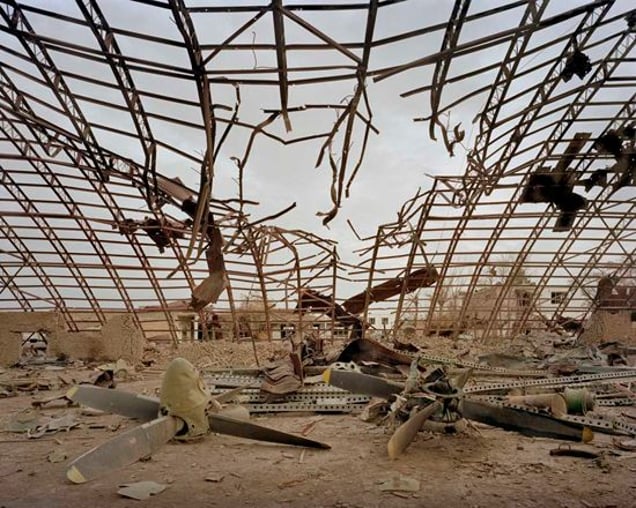 Military hangars containing spares for planes and helicopters at Kabul Airport, destroyed by American bombs. From "Forensic Traces of War" © Simon Norfolk