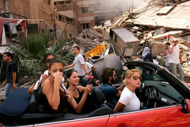 World Press Photo of the Year 2006, © Spencer Platt, USA, Getty Images, Young Lebanese drive through devastated neighborhood of South Beirut, 15 August