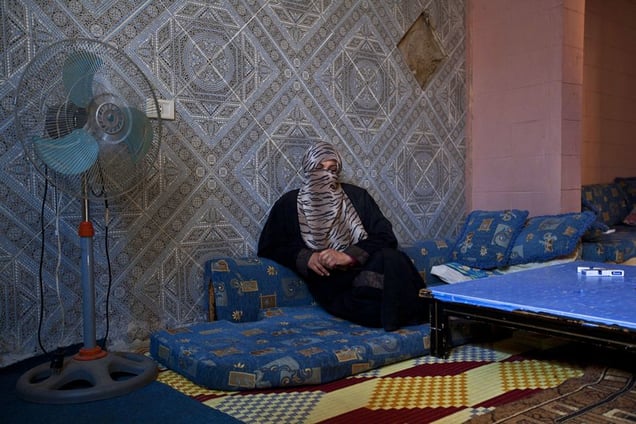 Faqaa, Lebanon. Selma, 35 years old, is from Zahra. She arrived two weeks ago, after her house was razed by tanks and mortar shelling of the Syrian Army. "We became refugees in our own place, just because we are Sunni," she says bitterly. Without documents and money, her family is forced to rely on donations and help from the Lebanese families of the village she now lives in.  © Matilde Gattoni