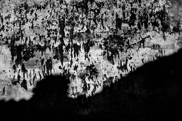 The cracked wall outside.