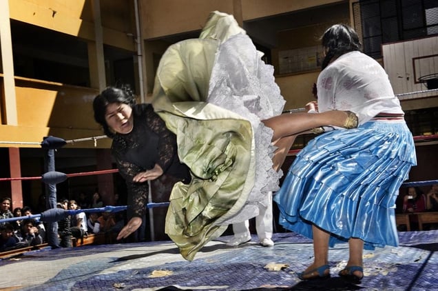 2nd Prize Arts and Entertainment Stories © Daniele Tamagni, Italy. The Flying Cholitas, Bolivia: Lucha libre (Bolivian wrestling) is one of the most popular sports in the country. Women wrestlers are known as cholitas and have become popular in the sport. Here, Carmen Rosa and Yulia la Pacena perform in a benefit show to raise money for the bathrooms of a school in La Paz, Bolivia, 26 June.