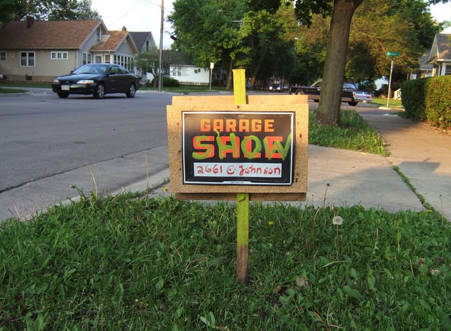 "Garage Show" (overpainted 'garage sale') sidewalk sign