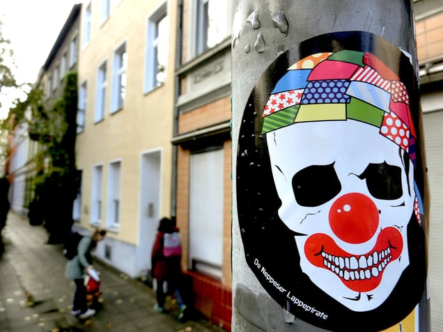 "Let's all drink To the death of a clown..."
