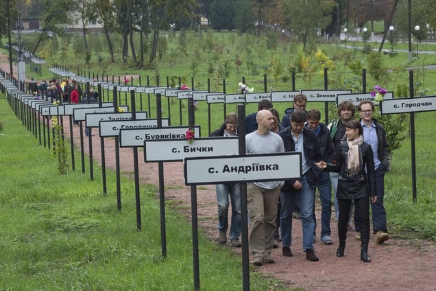 In the Exclusion Zone, a park commemorating the homes abandoned was opened in 2011. The signs are the names of all the villages evacuated. Chernobyl, September 21, 2013. © Gerd Ludwig / National Geographic Creative / National Geographic Magazine