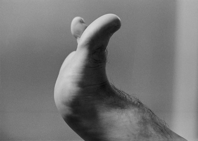 His toes is a thumb up