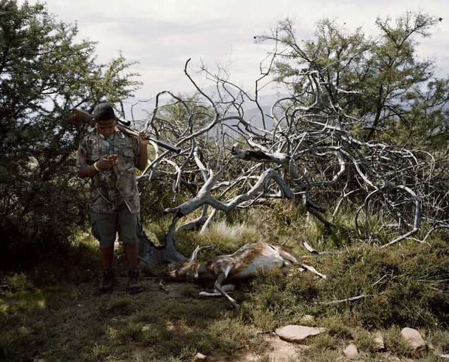 untitled novice hunter, cell phone and blesbok, eastern cape, south africa-from the series 'hunters'-David Chancellor