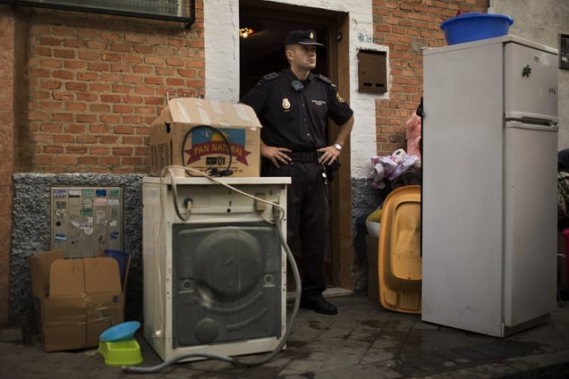 Amalio Barrul Gimenez and his family have been evicted. Amalio Barrul Gimenez (41), his pregnant wife Isabel Morales Bachiller (35) and their three children live on a low income, selling goods on the street and receiving benefits. Madrid, Spain, Tuesday, June 24, 2014. © Andres Kudacki / AP