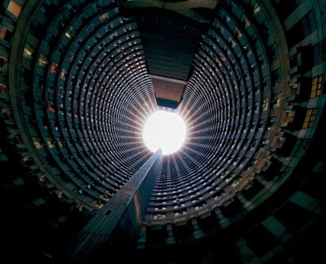 Ponte Tower,  a 52-floor circular structure, is the biggest residential building in the southern hemisphere.  20 years ago, Ponte was the place to live in downtown Johannesburg. The penthouses had mirrored bars and shag pile carpeting. Then Ponte lost its allure, becoming a no-go area during the 1990s overrun by Nigerian gangs, crack dens and prostitution. Now it has mostly immigrant residents.
