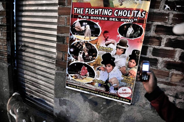 2nd Prize Arts and Entertainment Stories © Daniele Tamagni, Italy The Flying Cholitas, Bolivia: Lucha libre (Bolivian wrestling) is one of the most popular sports in the country. Here is a poster for a benefit show to raise money for the bathrooms of a school in La Paz, Bolivia, 26 June.