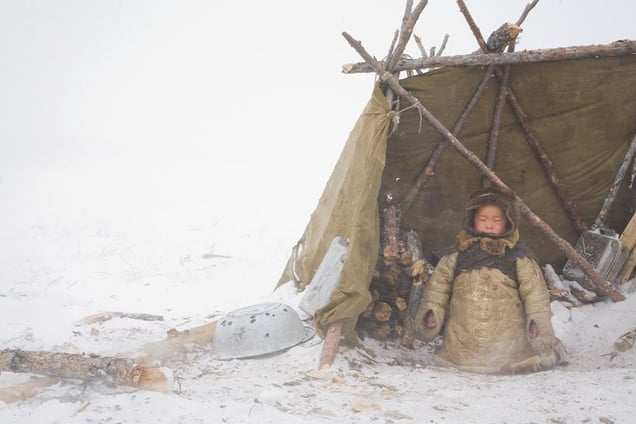 Denis in the camp by family teepee. Cherskiy. May, 2008 © Evgenia Arbugaeva