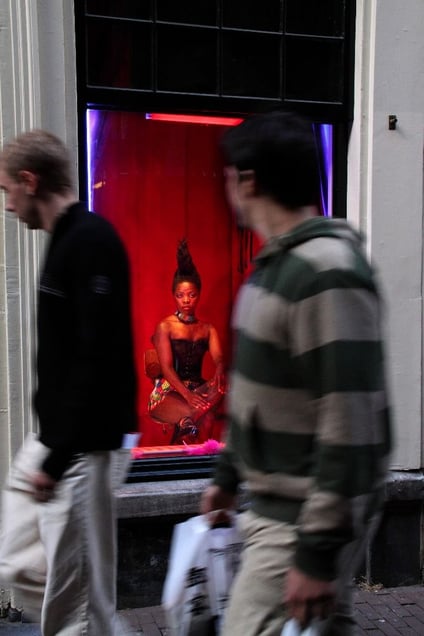 Documentation of intervention, Red Light District, Amsterdam. From the series "Being (T)here" © Zanele Muholi, courtesy of Huis Marseille