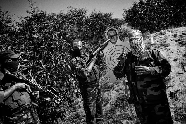 Abu Mohammed gives a speech during the shooting of a propaganda video for Al-Aqsa Martyrs Brigades