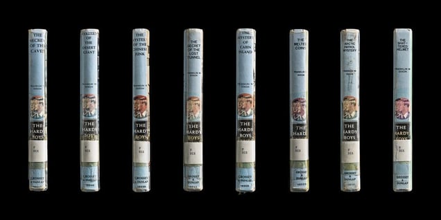 Multiple Spines, Hardy Boys Set (The Secret Caves, Mystery of the Desert Giant, The Mystery of the Chinese Junk, The Secret of the Lost Tunnel, The Mystery of Cabin Island, The Melted Coins, The Arctic Patrol Mystery, The Shattered Helmet) © Kerry Mansfield