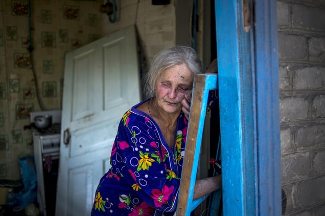 Local resident Galina Lobach, 67, in the village of Luhanskaya after the air attack
