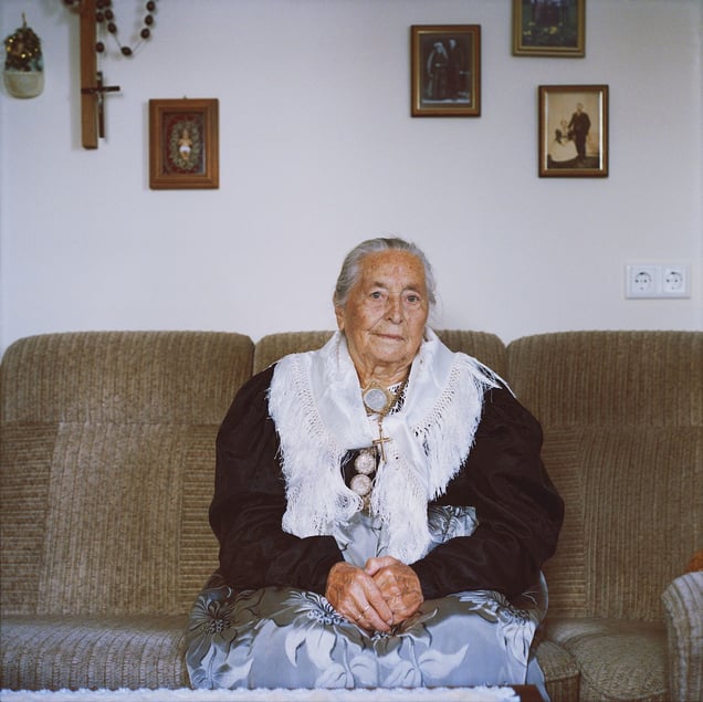 Viktoria Kreutmeier(b. 1921) in her special dress for church at High Christian Holidays, Aichacher Land, Bavaria, Germany, 2015. From the series: Village Queens. The last women in their traditional peasant garbs