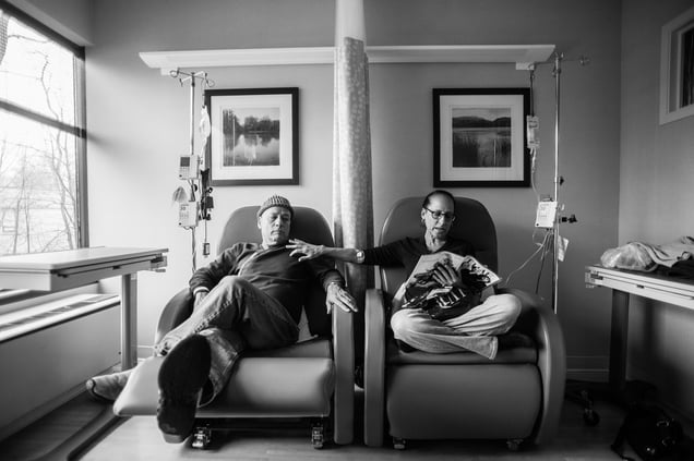 Howie talks about the “his and hers” chairs together at the oncologist’s office where they have their weekly chemotherapy. Howie and Laurel have been married for 34 years. Greenwich, Connecticut, January 2013. © Nancy Borowick