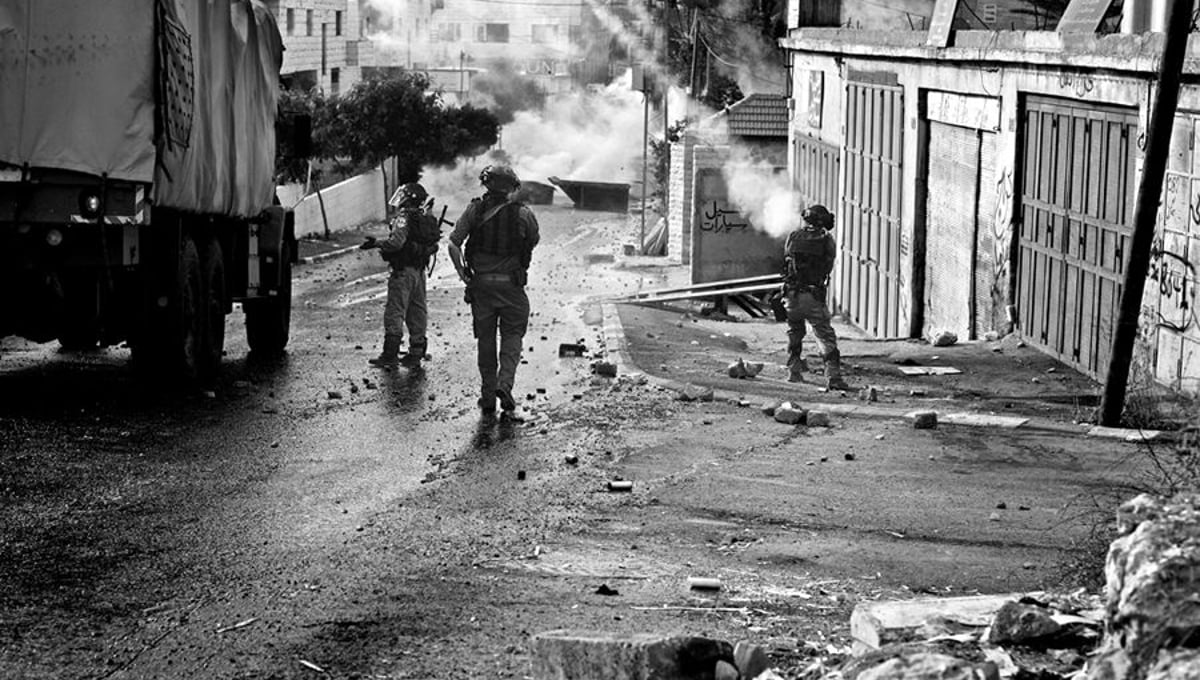 Israeli IDF enter Aida Camp with Tear gas, rubber bullets and dirty water. © Will Hilton