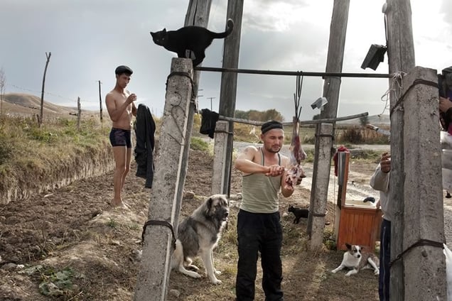 Cutting the sheep after the ritual.
From the series Apashka by © Pavel Prokopchik