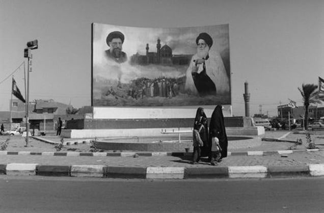 Iraq. Entrance to the former Saddam City, Baghdad. 2003. From the book "War Photographer: Between Shadow and Light" © Christine Spengler