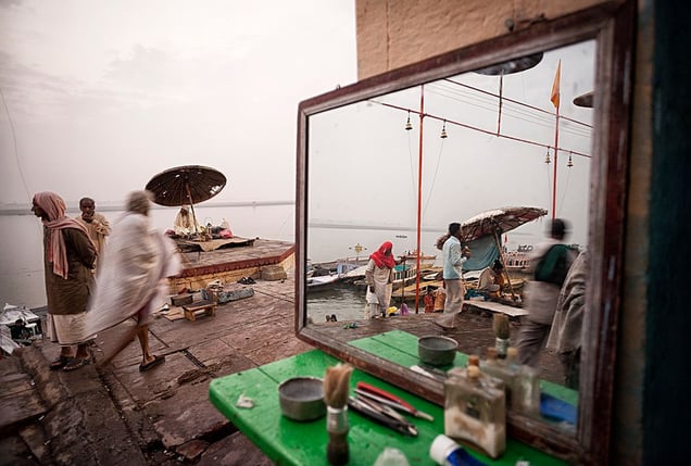 Varanasi, India: The local barber is ready for his work very early, for the ghats alongside the river of Ganges are full of worshippers and pilgrims. © Matjaz Krivic