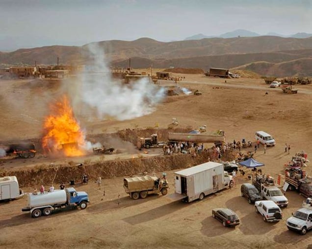 A controlled explosion of an American fuel convoy in Iraq being filmed on the set of ?Over There?, a Fox TV production about the life of a US Army platoon in contemporary Iraq. Being filmed in Chatsworth, just north of Los Angeles. From "Forensic Traces of War" © Simon Norfolk