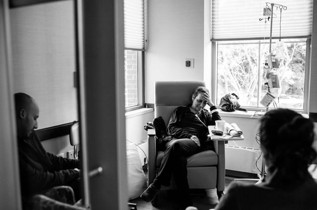 The Borowick children join their mother Laurel for her first chemotherapy treatment since Howard Borowick’s death, a few days earlier. The couple had gone to their respective treatments together over the course of the last year, side by side. Greenwich, Connecticut. December 2013 © Nancy Borowick