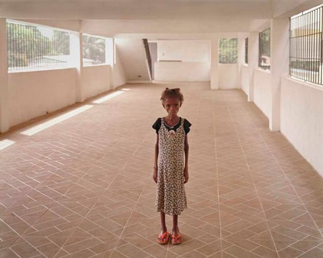 Oumuh, dying of AIDS. Monrovia, Liberia. From "Forensic Traces of War" © Simon Norfolk