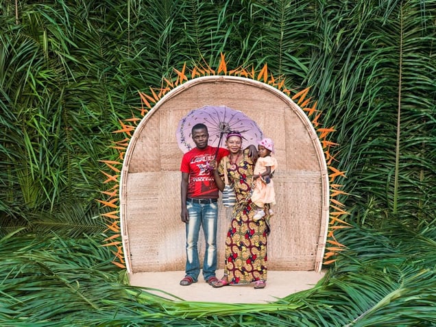 © Patrick Willocq - Walé Asongwaka, finally free. Immediately after the seclusion-ending festival, Walé Asongwaka (21 years old, 3 years in seclusion, mother of Bola) returned to her husband’s hut. The next day she and her child have flaunted their best set of clothes to the whole community.