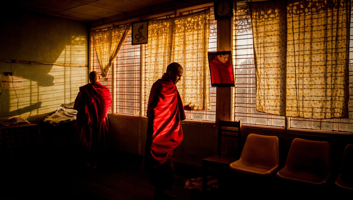 Monks at their home before morning alms in Mytchina, Myanmar.