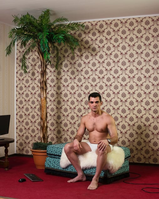 "Bucharest, Romania, April 2016: A 33-year-old cam model after his day shift in a room at Studio N2". From the Series "Live Chat Studio Industry".