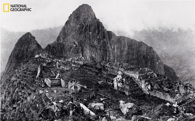 An elevated view of about half of Machu Picchu, the lost mountaintop city of the Inca in the Peruvian Andes. National Geographic supported Bingham's excavations at the site from 1912 to 1915. From the October 125th anniversary issue of National Geographic magazine © Hiram Bingham/National Geographic