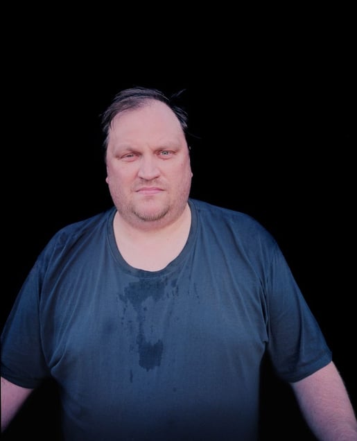 A sweating man. From the exhibition "Kainuu" © Jussi Sarkilahti