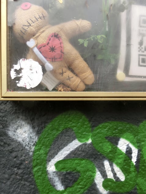 "DADA DEMONS" or "WATCH THE DOG THAT BRINGS THE BONE"