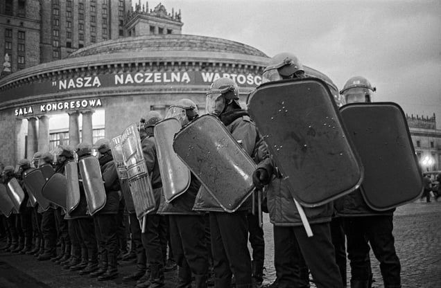 Heavy milicia presence at the Palace of Culture in Warsaw, during the last session of the XI Meeting of the Polish Communist Party (PZPR)  which saw the dissolution of the party. 29.01.1990 © Witold Krassowski (Poland), from the exhibition Transition.  Courtesy of the Noorderlicht Photofestival 2008.