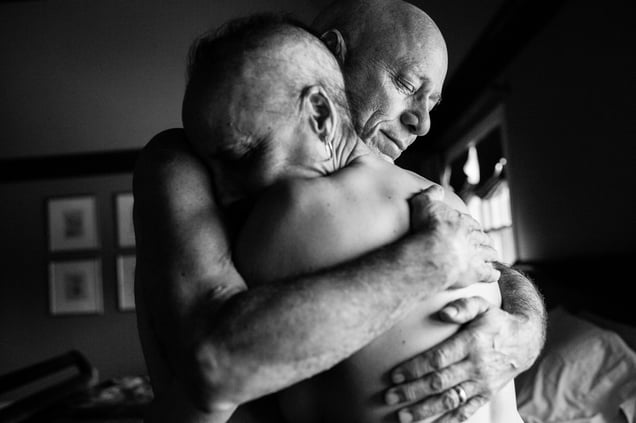 Howie and Laurel Borowick embrace in the bedroom of their home. In their 34- year marriage, they were diagnosed with stage-four cancer at the same time. New York, US, 08 March 2013.