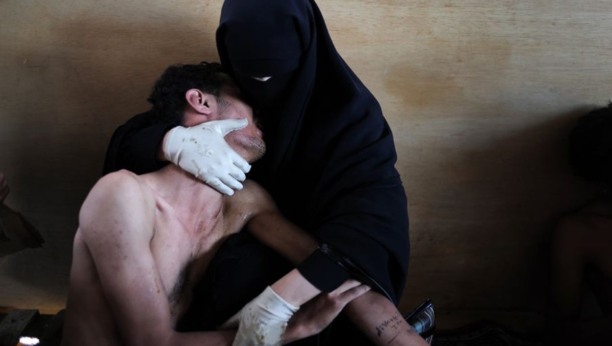 World Press Photo of the Year 2011: © Samuel Aranda, Spain, for The New York Times. Sanaa, Yemen, 15 October. A woman holds a wounded relative during protests against president Saleh.