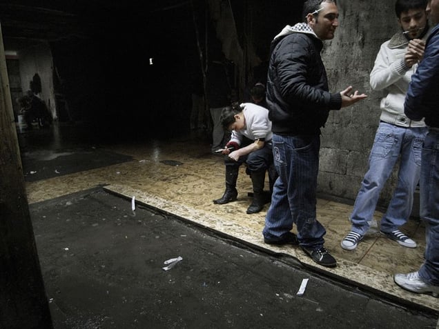 "La Scuola" or "I Puffi" (The School or Smurfs House), Scampia, Naples.
Arguably the most dangerous place in Italy, where an average of 300 people per hour go to have there shot, it used to be a kindergarten.
© Valerio Spada.