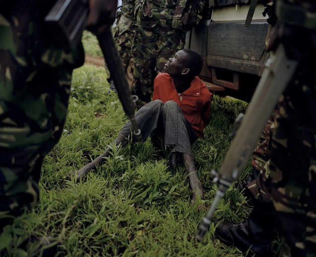 poacher, isiolo, northern kenya-from the series 'with butterflies and warriors'-David Chancellor